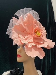 Ready to ship today from Tennessee, USA,  I ship quickly and package safely in boxes. See more beautiful choices at my Etsy Shop at https://www.etsy.com/shop/equineelan        This lightweight and gorgeous hat is a "fascinator hat" that attaches to your head with elastic. The FLOWER is pale true pink.   The Tulle Ribbon is Pale Pink.  The Flower measures a full 12" x 12". The hat is larger with bow.     This hat attaches with an elastic band that goes behind your ears and under your hair at the Garden Party Flower Hat With Handmade Flowers, Rose Wedding Fascinator With Handmade Flowers, Pink Feminine Fascinator For Wedding, Whimsical Flower-shaped Fascinator With Handmade Flowers, Rose Fascinator For Kentucky Derby Wedding, Flower Headpieces For Kentucky Derby, Rose Fascinator For Wedding And Kentucky Derby, Pink Headpieces With Handmade Flowers For Royal Ascot, Pink Handmade Flower Headpieces For Royal Ascot