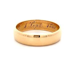 This Victorian 18 karat yellow gold wedding band captures the essence of the era with its rounded flat edge, offering a unique and elegant profile. The inside of the ring features the original wedding date engraving, adding a sentimental touch that connects to its rich history. Perfect for those who appreciate vintage beauty and historical significance, this wedding band is a testament to enduring love and tradition Formal Heirloom Style Signet Ring With Round Band, Heirloom Style Formal Signet Ring, Heirloom 14k Gold Wedding Band Thick Shape, Timeless Anniversary Signet Ring With Smooth Bezel, Formal Heirloom Style Signet Ring, Heirloom Yellow Gold Thick Band, Heirloom Engraved Ring With Decorative Wide Band, Heirloom Thick Band In Yellow Gold, Timeless Yellow Gold Rings With Decorative Band