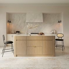 a kitchen with marble counter tops and wooden cabinetry, along with two black chairs