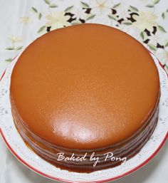 a chocolate cake on a plate with flowers