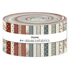 a roll of multicolored fabric with the words home and many different patterns on it