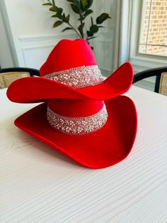 Get ready to make a statement with this Premium Suede Cowgirl Sombrero. Handmade in Mexico, this hat is a true testament to craftsmanship and quality. The soft suede material is perfect for any occasion, from casual outings with friends to formal events. The interior elastic band ensures a comfortable fit for all head sizes, while the silk linen adds an extra touch of luxury. This sombrero is not just a hat; it's an accessory that will elevate any outfit. Whether you're looking for protection from the sun or adding some flair to your style, this sombrero has got you covered. Its timeless design and premium materials make it an investment piece that will last for years. Size:S/M Mexico, Boot Pinata, Sombrero Cowgirl, Cowgirl Sombrero, Red Cowgirl Hat, Cowgirl Hat Outfit, Womens Hats, Chapeau Cowboy, Rancher Hat