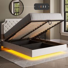 a bed with an open box underneath it