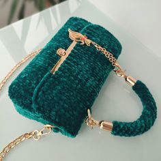 Luxurious and sophisticated, this tote bag is the perfect stylish addition to your wardrobe 😍  Whether you are looking for a gift for a special woman in your life or you are looking for a gift for yourself, this fabulous bag is the perfect choice to gift to your loved one.🔥 It is handmade from high-quality soft velvet thread. Available in a very distinctive emerald color adorned with gold-colored accessories that made it more beautiful and luxurious. The bag is lined and has a pocket inside to Luxury Satchel For Shopping With Mobile Phone Bag, Luxury Shopping Satchel With Mobile Phone Bag, Large Capacity Evening Shoulder Bag As Gift, Large Capacity Shoulder Evening Bag As Gift, Large Capacity Shoulder Evening Bag, Luxury Tote Box Bag With Mobile Phone Holder, Trendy Double Handle Box Bag For Gift, Trendy Double Handle Box Bag Gift, Top Handle Bag As Gift