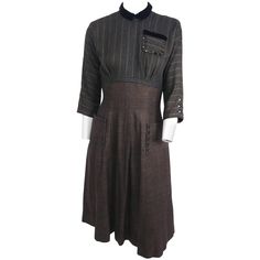 1940s Day Dress with Novelty Button Trim. Vertical strip bodice with gathered bust, contrast brown skirt. Velvet trim on collar and breast pocket. Button trim on pockets and sleeves. Rouched Dress, Time Traveler, Novelty Buttons, Brown Skirt, Shirred Dress, Gathered Dress, Brown Skirts, 60s Dress, Vintage Fits