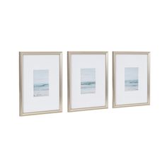 three framed pictures hanging on the wall next to each other in front of a white background