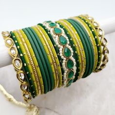 Beautifully designed bangles for any occasion. South asian bracelets come in a variety of styles, colors, and finishes. We at Banglez take creating the perfect bangle set for you to another level! You could say helping you find your favorite stack of bangles as one of our greatest missions. This bangle set was curated in house by one of our talented team members. We hope you love them as much as we do! Handmade Bollywood Style Bangle For Celebration, Handmade Bollywood Bangle For Celebration, Adjustable Bangle Bracelet For Diwali, Bollywood Style Handmade Bangle For Celebration, Adjustable Round Bangle For Diwali, Bollywood Style Bangle Jewelry As Gift, Adjustable Bangle For Diwali, Adjustable Hand Set Bangle For Celebration, Adjustable Hand-set Bangle For Celebrations