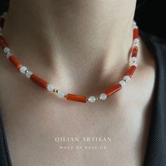 *Handcrafted Excellence: Each piece is meticulously handmade, ensuring a personal touch in every choker necklace. *Adjustable Size: Features a 14-inch choker length with a 5cm extension chain for customizable fitting. *Exclusive Design: Designed exclusively by me, this choker showcases a unique blend of creativity and craftsmanship. Key Highlights of the "Red Agate & White Jade" Choker Necklace: *Main Materials: This unique choker necklace is primarily made of red agate and white jade. The combination of these materials gives the necklace a distinctive style and profound meaning. *Red Agate: The cylindrical red agate pieces are deeply polished and intricately carved, setting the tone for the overall design with their vibrant color and natural beauty. The rich red hue of the agate exudes wa Agate Spacer Beads Jewelry Gift, Handmade Spiritual Choker As A Gift, Handmade Spiritual Choker For Gift, Elegant Choker With Natural Stones And Round Beads, Gemstone Beaded Choker Necklace As Gift, Gemstone Beaded Choker Necklace For Gifts, Minimalist Gemstone Beads Choker As Gift, Minimalist Gemstone Beads Choker Gift, Amber Beaded Necklaces With Spacer Beads As Gift