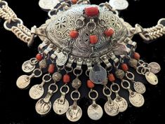 This antique Berber ceremonial necklace is unique and museum quality. A collector's rare one-of-a-kind find!  Coins are Arabic and Spanish dating between 1881 (1298 in the Muslim calendar) and 1917 in the Gregorian calendar. The Spanish coins are marked "Alfonso XIII".  The center amulet is egg-shaped and measures 5 inches wide x 3.75 inches tall x 2.5 inches deep. Total weight is 1.38 pounds. I bought it from a collector in Tangier in 1964. Free shipping within the US. If you live abroad, please message me for shipping cost. Gregorian Calendar, Live Abroad, Tangier, Sarasota Fl, Early 1900s, Necklace Etsy, Jewelry Necklace Pendant, Jewelry Making, Pendant