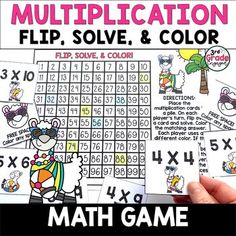 a hand holding up two cards with numbers on them and the words'multiplication flip solve & color '