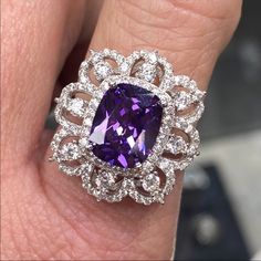 Anna Zuckerman Luxury 10 Carat Amethyst Cocktail Ring In 925 Sterling Silver New! Luxury High End Designer Azl Retail Price: $199 Size - 6 (Can Be Resized) 10 Carat Total 8 Carat Cushion Cut (Rectangular) Amethyst 2+ Carats (Total) Diamond Crystalline Scalloped Halo Solid 925 Sterling Silver With Platinum Plating Includes Gift Box & Jewelry Polishing Cloth February Birthstone Stunning 8 Carat Cushion Cut Amethyst With A 2+ Diamond Crystalline Double Flower Crown Scalloped Halo In A 925 Sterling Purple Cushion Ring, Fine Jewelry Purple Platinum Rings, Luxury Purple Platinum Rings, Purple Platinum Rings Fine Jewelry, Silver Platinum Gemstones With Vvs Clarity, Silver Platinum Amethyst Ring Fine Jewelry, Luxury White Gold Amethyst Ring With Halo Setting, Luxury Purple Amethyst Ring In Sterling Silver, Silver Platinum Amethyst Ring With Center Stone