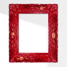 a red frame hanging on the wall