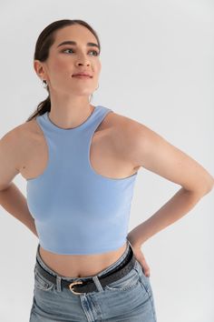 Your favorite fabric, now in tank form. Designed with our Magic Double-Knit Cupro fabric for a soft feel against your skin and a body-hugging fit. Made to be versatile for light workouts and lounging at home. Or for a more elevated look, style with jeans, jewelry, and a heel. High Stretch Racerback Top With Built-in Bra, Basic Fitted Bra-friendly Tank Top, Basic Fitted Tank Top Bra Friendly, Gym Tops With Built-in Bra, Fitted Crop Top With Light Support For Pilates, Fitted Crop Top For Pilates, Fitted Athleisure Tank Top With Built-in Bra, Basic High Stretch Top With Built-in Bra, Casual Tank Top With Built-in Bra And High Stretch