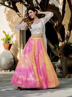 Introducing our stunning "pretty multi-color leheriya printed art silk sangeet wear lehenga choli"! This exquisite ensemble is designed to make you feel like royalty at any festive occasion, event, reception, or function like a sangeet. Crafted with care and attention to detail, this lehenga choli features a multi-color art silk material with leheriya printed work and beautiful pearl zari border work, adding a touch of elegance and sophistication to your look.
The accompanying white color choli Multicolor Bollywood Lehenga With Unstitched Blouse, Multicolor Art Silk Lehenga With Unstitched Blouse, Multicolor Anarkali Set For Summer, Semi-stitched Multicolor Sharara With Bandhani Print, Bollywood Style Art Silk Multicolor Lehenga, Bollywood Style Multicolor Art Silk Lehenga, Bollywood Style Multicolor Lehenga For Eid, Multicolor Summer Anarkali Set, Multicolor Lehenga With Unstitched Blouse