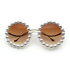 Perfectly retro, both iconic and trendy, these are surely the most fun shades for you this season. Inspired by the 70s music scene, these will bring out your inner hippie vagabond spirit. Perfectly circle round silhouette with super blingy pearl jewel trim. Classic gradient 100% UV400 polycarbonate lens will give you a perfect pimpy vibe. Made with alloy metal frame, adjustable English style nose pads, and reinforced metal hinges. (c734) Size: 52-26-129.  Color: Brown.  Gender: female.  Age Grou Round Eyewear, Pearl Jewels, Aviators Women, 70s Music, Aviator Sunglasses Mens, Metal Hinges, Metal Sunglasses, Round Circle, English Style