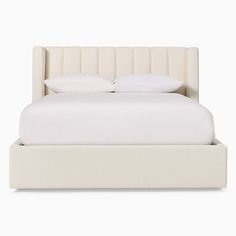 a bed with a white headboard and pillows on it's sides, in front of a white background