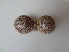 Traditional Norwegian (Solje) wedding brooch by David Andersen, Oslo, made 1888-1925. In the shape of two Viking shields, very delicately crafted, completely gold-plated and partly cloisonne enamelled. Stamped on the back with the David Andersen hallmark and 830 pp. Width 4.5 cm, 1.8 inches, depth 2 cm, 0.8 " and height approximately 1 cm Condition: partial loss of enamel Viking Shields, Viking Shield, Wedding Brooch, The David, Cloisonne Enamel, Vikings, Brooch Pin, Brooches, Stamp