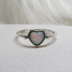 Vintage Sterling Silver White Opal Heart Ring ...Marked 925...Total of weights 1.2gramsMeasure of Face 7.1MM...It's in very good condition. Valentine's Day Hallmarked Heart Ring, Adjustable Sterling Silver Heart Ring, Stackable Open Heart Sterling Silver Ring, Silver Heart Ring Stamped 925, Sterling Silver Double Heart Ring With Birthstone, Silver Hallmarked Heart Ring, Silver Hallmarked Heart Cut Ring, Silver Heart Cut Hallmarked Ring, Silver Heart Cut Hallmarked Heart Ring