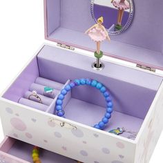 Jewelkeeper Music Boxes are perfect for storing and organizing your little girl's treasures. Our ballerina music box has two drawers with lavender lining, and plays the classic Swan Lake tune. Crafted with durable pine fiberboard and silver-tone latch, it meets safety guidelines. Packaged in a Gift Box, it's the ideal birthday gift for girls. Measures 6.75 x 5.25 x 6 inches (L x W x H). Shop Jewelkeeper Music Boxes and create memorable moments today! Ballerina Musical Jewelry Box, Box With Drawers, Ballerina Decor, Music Box Ballerina, Ballerina Jewelry Box, Kids Jewelry Box, Ballerina Jewelry, Dancer Gift, Girls Jewelry Box