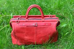 #LeatherDuffelBag  #Duffelbagleather  #travelbag   #genuineleatherbag #luggagebagleather Red Travel Briefcase With Top Carry Handle, Red Leather Travel Briefcase, Red Leather Travel Duffle Bag, Red Leather Duffle Bag For Travel, Red Leather Purse, Leather Duffel Bag, Leather Weekender Bag, Leather Duffel, Leather Weekender