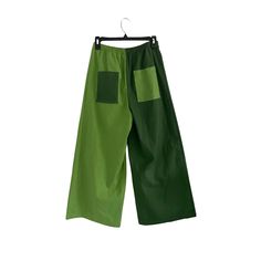 Cutest Split Leg Pants! Two shades of green, made to order slow fashion! Green Straight Leg Bottoms For Loungewear, Green Straight Leg Loungewear Bottoms, Green Wide Leg Pants With Pockets, Green Fall Loungewear Bottoms, Spring Green Baggy Wide Leg Pants, Green Wide-leg Sweatpants For Loungewear, Spring Green Loose Fit Wide Leg Pants, Green Wide Leg Pants With Side Pockets, Trendy Baggy Green Wide Leg Pants