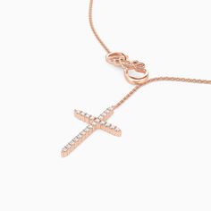 The paved cross pendant drop falls from a luxurious chain, creating an endless lariat necklace. On the other end, a polished infinite symbol consists of a word of love standing elegantly on the cross's top. Love and faith living in the same line create a dazzling beauty on this whimsical necklace.Carat Weight: 0.132 ctStone Size: 1.1 mmStone Type: Moissanite/GemstoneNumber of Stones: 22 Stone Color: OptionalStone Shape: RoundChain Type: O-chainWidth: 20.5 mmHeight: 37.7 mmThickness: 3.5 mmMateri Luxury Symbolic Cross Necklace, Elegant Pendant Cross Necklace With Adjustable Chain, Elegant Cross Necklace With Adjustable Chain, Elegant Crucifix Necklaces With Adjustable Chain, Elegant Crucifix Necklace With Adjustable Chain, Elegant White Gold Cross Necklace With Adjustable Chain, Luxury Cross Jewelry With Adjustable Chain, Elegant Adjustable Crucifix Jewelry, Elegant Sterling Silver Cross Necklace With Adjustable Chain