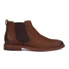 The Lyle is a stylish Chelsea boot that is a must-have for everyone. Crafted from genuine leather, it promises durability and timeless elegance throughout the seasons. With its sleek silhouette and comfortable fit, the Lyle boot offers versatile style for any occasion. Whether paired with jeans or dressed up for a formal event, its classic design ensures you always look polished and refined. Elevate your footwear collection with the enduring appeal and quality craftsmanship of the Lyle. Classic Brown Work Boots With Leather Footbed, Rugged Leather Chelsea Boots For Work, Business Chelsea Boots In Suede With Snip Toe, Business Chelsea Boots With Snip Toe In Suede, Rugged Chelsea Ankle Boots For Business, Classic Brown Leather Work Boots, Classic Work Boots With Suede Lining For Fall, Classic Fall Work Boots With Suede Lining, Moc Toe Boots With Suede Lining For Work