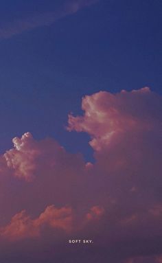 an airplane is flying in the sky with some clouds behind it that reads soft sky