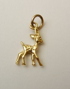 100% AUSTRALIAN MADE BRAND NEW GENUINE SOLID 9CT YELLOW GOLD 3D BAMBI DEER CHARM/PENDANT (with yellow gold jump ring) GENUINE SOLID GOLD   NOT FILLED   NOT HOLLOW   NOT PLATED HALLMARKED (Stamped) 9ct Item Measurements -  Length : 17 mm (size not including jump ring) Width : 6 mm Weight : 1.05 grams approx. Jump ring can fit up to 3.5 mm thick chain Quality Solid Charm / Pendant crafted with Precision and Detail. QUALITY GUARANTEED. Buy with confidence. If you are not satisfied you can return it Deer Jewelry, Deer Necklace, Gold Deer, Deer Animal, Jump Rings, Charm Bracelets, Charm Pendant, Solid Gold, Deer