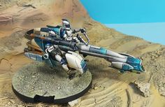 a sci - fi fighter ship on a desert terrain