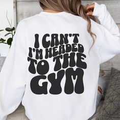 Sorry, I can't. I'm Headed to the Gym Sweater -- For fitness enthusiasts who are always on the move. This hoodie is your perfect workout companion, declaring your dedication to health and wellness with style. Comfortable, motivating, and ready to hit the gym! ✨for oversized fitting please size up 1-2 sizes from normal unisex size, please refer to size chart attached!✨ 🔥ABOUT THE SWEATSHIRT🔥 This unisex heavy blend sweater is a great addition to any wardrobe! The spun fibers provide a smooth and wonderful surface which always leads to having a no itch experience! -50/50 Polyester/ cotton  -classic fit -runs true to size (refer to sizing chart) -unisex sizing, perfect for men & women - sizes: small - 3XL - size up 1-2 sizes from normal for over sized feel -order normal size or size down 1 Cotton Workout Sweatshirt With Letter Print, Fall Workout Tops With Letter Print, White Letter Print Sweatshirt For The Gym, White Letter Print Sweatshirt For Gym, Cotton Sweatshirt With Letter Print For Workout, Workout Sweatshirt With Letter Print For Sports Season, Letter Print Sweatshirt For Sports Season Workout, White Gym Sweatshirt For Fall, Oversized Letter Print Sportswear Sweats