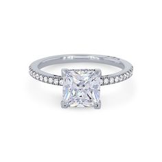 a princess cut diamond ring with pave set shoulders