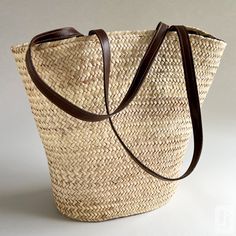 Embrace the warmth and vibrancy of the Mediterranean lifestyle with our stunning Large Woven Koffa from Tunisia. Handcrafted with the utmost care and attention to detail, this artisanal straw bag boasts a functional and beautiful design that is sure to capture your heart. The intricate straw weave evokes the rich cultural heritage and traditional style of the Mediterranean region. The sturdy leather straps provide both comfort and durability, making it easy to carry all your essentials, from fre Mediterranean Lifestyle, Brown Leather Strap, Cultural Heritage, Tunisia, Fresh Produce, The Mediterranean, Green Leather, Traditional Style, Red Leather