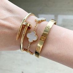 Single available or set. Set in gold. Allow 2-5 business days for delivery Van Arpels Jewelry, Bracelet Stack Van Cleef, Stacking Cartier Bracelets, Designer Bracelet Stack Gold, Dream Bracelet Stack, Stacked Cartier Love Bracelets, Can Cleef Bracelet Stack, Van Cleef And Arpels Aesthetic, White Gold Cartier Love Bracelet