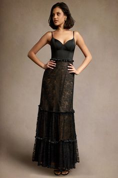 Our Jennifer Ruffle Maxi Dress is the perfect dress for evening events. This style includes a beautiful sweetheart neckline crafted from satin paired with an A-line lace ruffle skirt. Wear this beauty to your next formal night out or a wedding reception. Black Lace Ruffle Dress, Satin Corset Dress With Ruffles For Evening, Evening Satin Corset Dress With Ruffles, Elegant Corset Dress With Ruffled Straps For Party, Formal Corset Dress With Sweetheart Neckline And Ruffles, Elegant Fitted Corset Dress With Ruffles, Gala Lace Dress With Scalloped Lace And Sweetheart Neckline, Elegant Spaghetti Strap Evening Dress With Ruffles, Fitted Evening Dress With Sweetheart Neckline And Ruffles