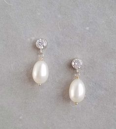 Large pearl and Cubic Zirconia stud earrings MADE IN USA🇺🇸 Elegant White Clip-on Earrings With Pearl Charm, Pearl-embellished Cubic Zirconia Drop Earrings, Elegant Pearl White Clip-on Earrings With Pearl Drop, Delicate Cubic Zirconia Pearl Earrings For Gift, Delicate Pearl Earrings With Cubic Zirconia For Gift, Dainty Pearl Earrings With Cubic Zirconia For Formal Occasions, Classic Pearl Drop Clip-on Earrings, Classic Pearl Embellished Drop Earrings, Classic Pearl Embellished Earrings For Anniversary