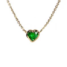 The perfect gift for the one you love, a beautiful 14k gold natural green emerald heart shaped necklace. ---------------D E T A I L S--------------- - Approximately .15 - .20 carat total weight natural emerald heart | 3.7 x 3.6 mm - Set in a 14k gold bezel setting - 14k gold cable chain with spring ring - Available in 14k white, yellow or rose gold - Sizes 15 - 20 inches Heart Cut Emerald Necklace For Gift, Green Heart-shaped Emerald Necklace For Gift, Heart-shaped Green Emerald Necklace As Gift, Heart-shaped Green Emerald Necklace For Gift, Elegant Green Heart-shaped Emerald Necklace, Elegant Heart-shaped Green Emerald Necklace, Heart Cut Emerald Necklaces For May Birthstone, Heart Cut Emerald Necklace For May Birthstone, Green Emerald Heart-shaped Necklace