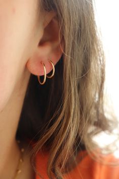 These sweet and delicate little hoops are the newest addition to our earring collection. Simple + effortless, our Goldie Hoops are a favorite for everyday style. MEASUREMENTS Available in 14k Gold Fill or Sterling Silver in 10mm, 14mm, or 16mm diameter14k Rose Gold Fill available in 16mm diameterChoose between a single earring or a pair. Tiny 14k Gold Hoop Earrings For Everyday, Simple 14k Gold Huggie Earrings For Everyday, Simple Everyday 14k Gold Huggie Earrings, Everyday Simple 14k Gold Huggie Earrings, Classic Tiny Cartilage Earrings For Everyday Wear, Tiny Classic Cartilage Earrings For Everyday, 14k Gold Filled Cartilage Earrings For Everyday, Classic 14k Gold Filled Cartilage Earrings For Everyday, Simple 14k Gold Huggie Hoop Earrings