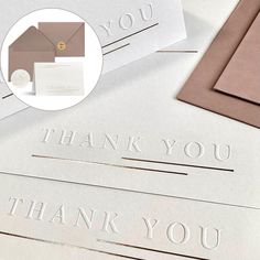 thank you cards and envelopes with the word thank you printed on them next to each other