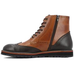 The Elijah boot by Thomas & Vine is crafted with authentic leather and wingtip details for an upscale look. A classic lace-up closure with brogue accents secures this well-made ankle-high style. The style is completed with a 6 mm Comfort Foam� footbed and a modern EVA outsole for a light and comfortable fit. Vintage Lace-up Boots With Brogue Detailing, Formal Wingtip Lace-up Boots For Winter, Winter Formal Lace-up Boots With Brogue Detailing, Wingtip Lace-up Boots With Brogue Detailing For Fall, Fall Wingtip Brogue Lace-up Boots, Classic Wingtip Lace-up Boots For Winter, Fall Wingtip Lace-up Boots With Brogue Detailing, Winter Cap Toe Lace-up Boots With Brogue Detailing, Winter Business Lace-up Boots With Brogue Detailing