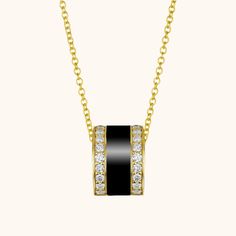 Dazzling and dainty – the perfect combo for an everyday diamond pendant. A gold pendant with a 14K chain for extra shine. $695 Ashita $1980 Estimated Retail. Spring Necklace, Vs Diamond, Black White Gold, Midnight Black, White Rose Gold, Black Enamel, Black Rose, Diamond Pendant, Gold Pendant