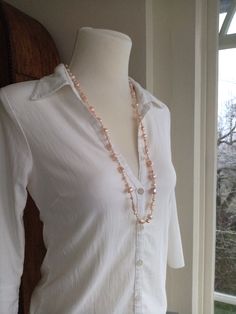 "When creating I'm always left with an array of leftover pearls. One of a set of three, this necklace is constructed of cleanup strays from my drawers, each beautiful in its own way. This is one of my recent creations, a long statement necklace with non-dyed peach/salmon/light pink pearls, carefully sorted to size with large ones in the center. The quality is overall exellent with iridescent metallic shades that melt together. Knotted on silk cord with a sterling silver toggle clasp. Length: 82c Peach Salmon, Long Statement Necklace, Pink Pearls, Silk Cord, Salmon Pink, Pink Pearl, Toggle Clasp, Handmade Artisan, Freshwater Pearls