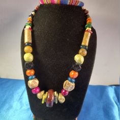 Peruvian Necklace In Natural Stone Of More Powerful Protection. These Stones Are Considered A Great Source Of Positive Energy And Can Be Used By Anyone With Mental Strength. They Are Also Considered Very Effective Energy Protection Stones. This Necklace Is Handmade By Peruvian Artisans In The City Of Cusco. Artisan Multicolor Hand-strung Necklaces, Artisan Multicolor Single Strand Necklace, Colorful Adjustable Traditional Necklaces, Multicolor Fair Trade Necklace With Round Beads, Multicolor Single Strand Necklace For Festival, Artisan Multicolor Jewelry With Wooden Beads, Multicolor Hand-strung Jewelry, Artisan Multicolor Wooden Beads Jewelry, Colorful Hand-strung Jewelry