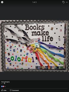 a bulletin board with books make life written on it and lots of colorful streamers