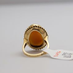 "For sale: (1) d696 Gorgeous 14k Yellow Gold Cameo Ring PLEASE READ ENTIRE DESCRIPTION BEFORE PURCHASING Pre-owned item. Good condition. Please see pictures for details. Sold as is, as seen on pictures. Specifics: 14k Yellow gold Size: 6.75 (U.S.) Width: 23.5 mm Total Weight: 6.7 grams Please be 100% sure of your purchase before buying, as we do not offer refunds. We are more than happy to provide any specific pictures, or answer any questions you have regarding our items. All jewelry is confirm Formal Fine Jewelry Ring With Cabochon, Formal Fine Jewelry Cabochon Ring, Formal Hallmarked Oval Cabochon Opal Ring, Yellow Gold Polished Opal Ring, Formal Amber Rings In Fine Jewelry Style, Amber Rings For Formal Occasions In Fine Jewelry Style, Formal Amber Ring Jewelry, Amber Rings For Formal Occasions, Fine Jewelry, Victorian Style Hallmarked Opal Ring In Yellow Gold