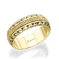 a yellow gold ring with diamonds on it