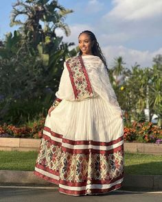 Description Step into a world of opulence and tradition with our Burgundy Tilet Habesha dress, a stunning homage to Ethiopian cultural heritage. Adorned with intricate patterns and exquisite detailing, this garment epitomizes the timeless elegance of the Habesha Kemis. The rich burgundy hue exudes sophistication, while the meticulous tilet designs pay homage to Ethiopia's artistic legacy. Each stitch tells a story, weaving together centuries of tradition with contemporary flair. Experience the allure of Ethiopian dress redefined for the modern woman, where every thread is a testament to the enduring beauty of Ethiopian culture. Material Cotton Thread Menen Estimated delivery : 6 weeks to 8 weeks Delivered to your door 14days return policy Free shipping to North America (The US & Canada), E Eritrean Clothing, Middle Eastern Clothing, Eritrean Dress, Ethiopian Clothing, Habesha Dress, Ethiopian Traditional Dress, Ethiopian Women, Ethiopian Dress, Habesha Kemis