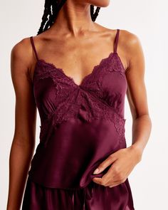 Classic sleep cami in our silky soft satin fabric, featuring lace-trim details at the v-neckline and down the bodice, underbust seaming details, adjustable straps and an elasticated back for the perfect fit to keep you comfortable all night. 2000s Tops, Womens Matching Sets, Satin Cami, Womens Cami, New Arrival Dress, Women Lace, Sleepwear Women, Swimwear Accessories, Satin Fabric