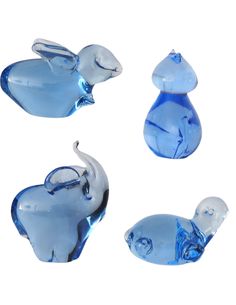 three glass elephant figurines sitting next to each other