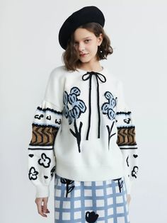 <Size>

 *Unit: cm 







size 

 bust 

 Sleeve Length 

 Length 











F 

 112 

 46 

 58 













 <Material>



 15% wool

 20% Acrylic

 20% nylon

 45% polyester 







 ＜Model wearing＞



 Wearing size



 F size




 Model Dimensions



 Height: 168cm

 Bust: 80cm

 Waist: 60cm

 Hips: 90cm White Winter Sweater With Floral Embroidery, White Floral Embroidered Long-sleeved Sweater, White Floral Embroidery Winter Sweater, White Long Sleeve Sweater With Floral Embroidery, White Floral Embroidery Sweater For Winter, Winter White Long Sleeve Sweater For Spring, White Jacquard Knit Sweater For Fall, Chic White Jacquard Knit Sweater, Cream Sweater With Floral Embroidery For Spring